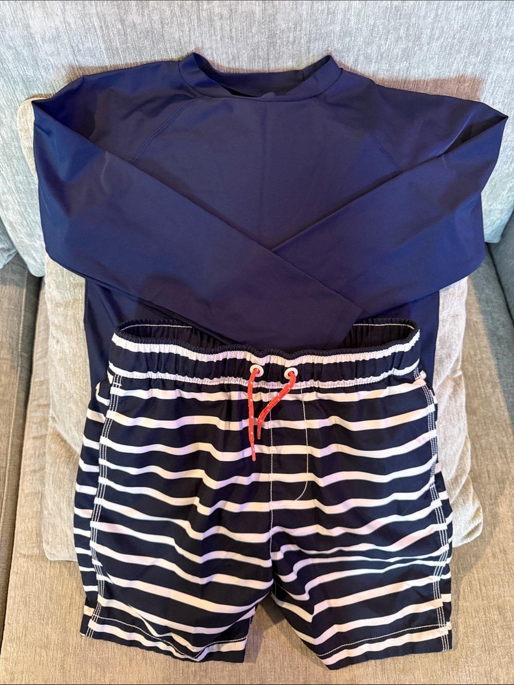 Gap Kids swim trunks (L) and long sleeve rash guard (12). Both like brand new!